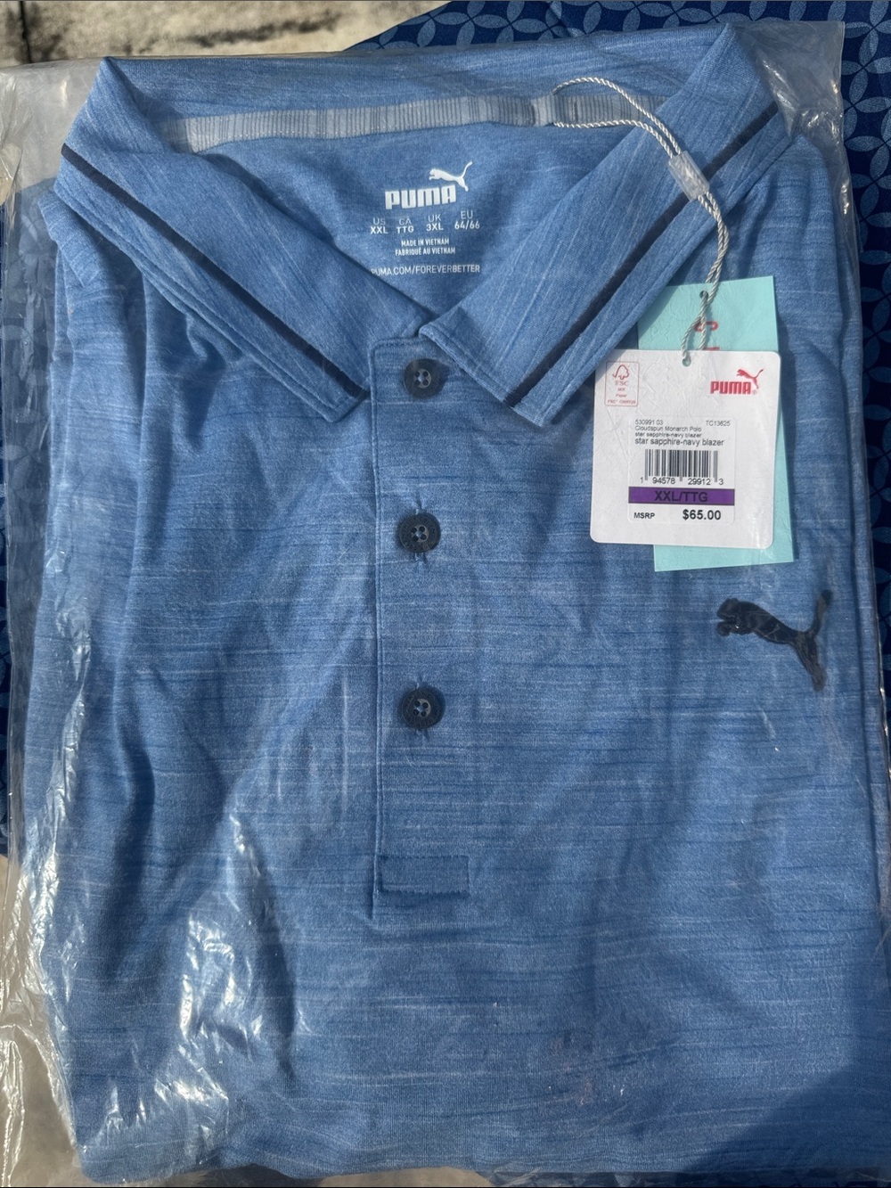 Puma Men's Heathered Light Blue Polo with Embroidered Logo